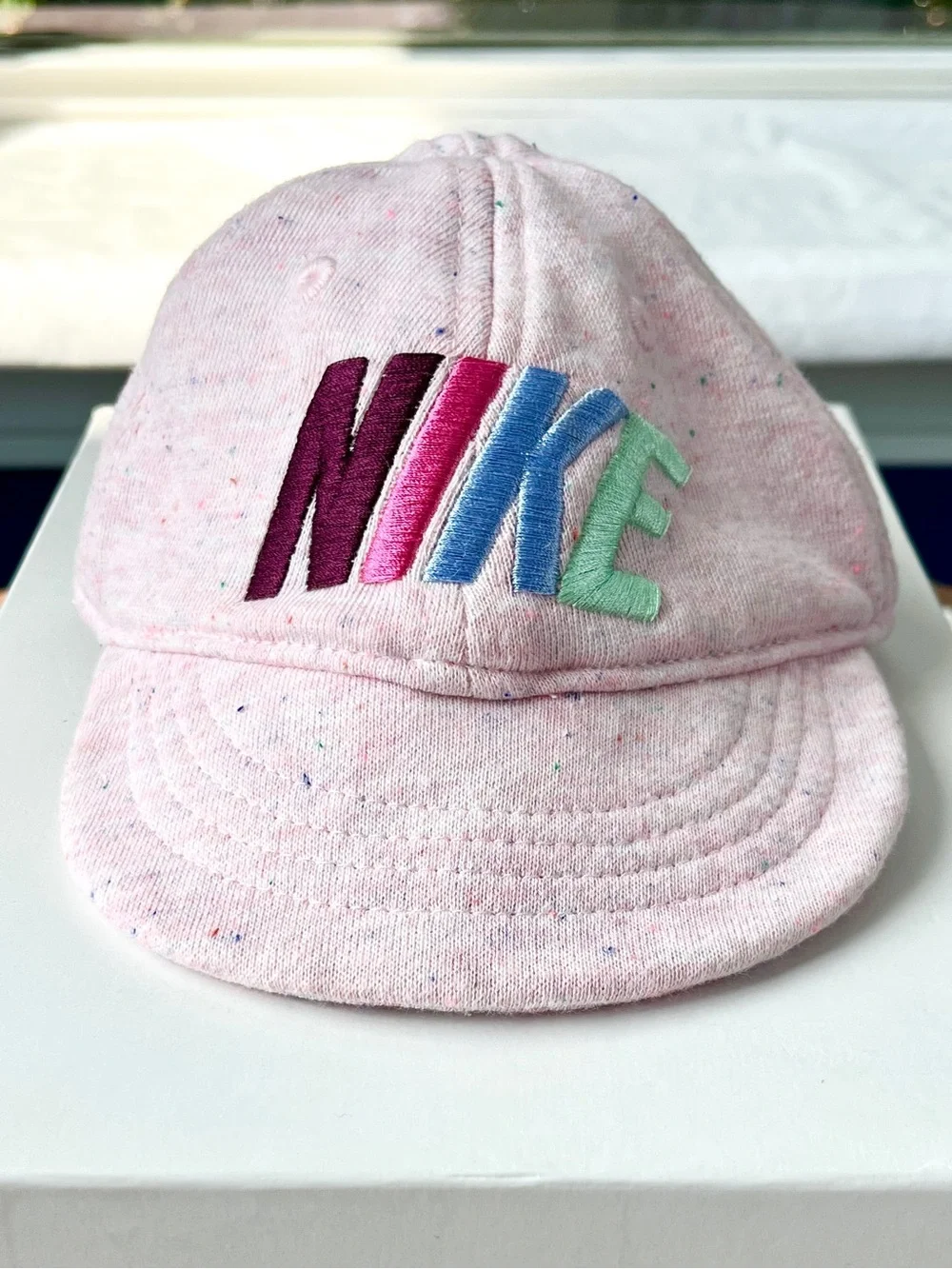 Nike Baby French Terry Knit Cotton Cap in “Speckled Pink Foam”